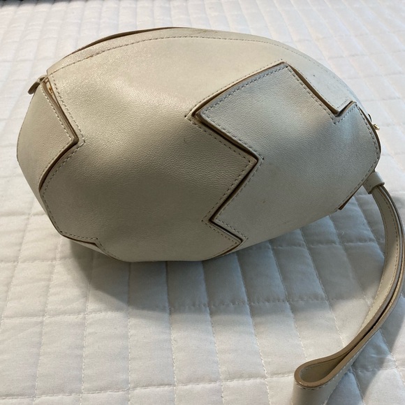 Moschino Handbags - Moschino egg-shaped leather mini bag with a wristlet strap